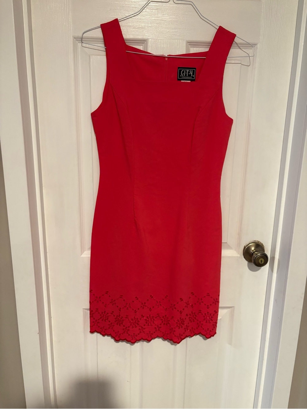 City Triangles Sleeveless Sheath Dress with Laser-Cut Hem Detail